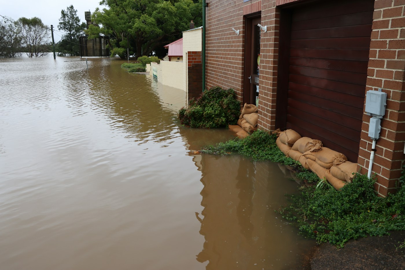 Flood water surrounding a property after a large water event